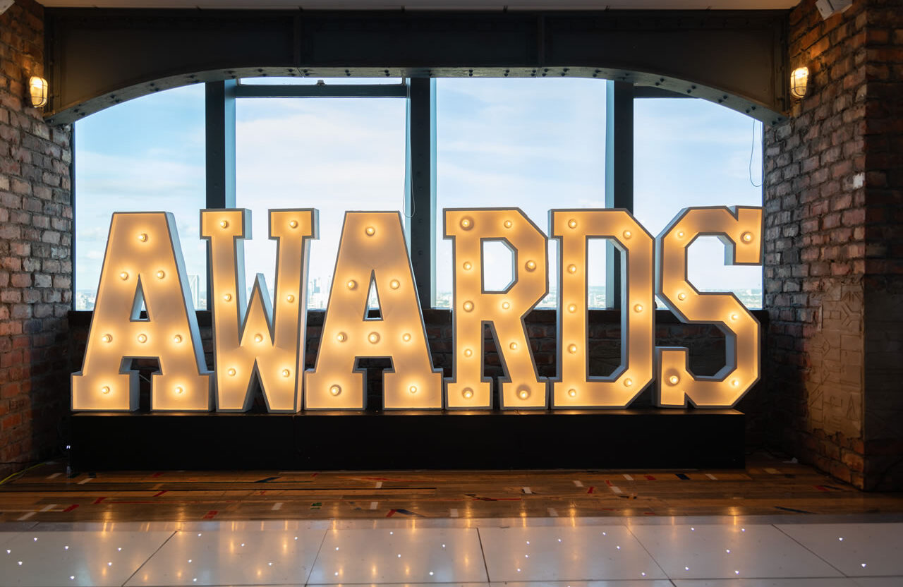 An image of event lights made up into the word "awards"