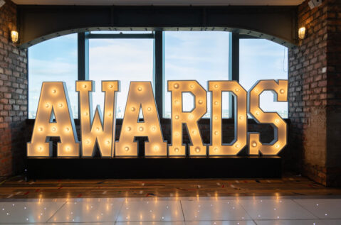 An image of event lights made up into the word "awards"
