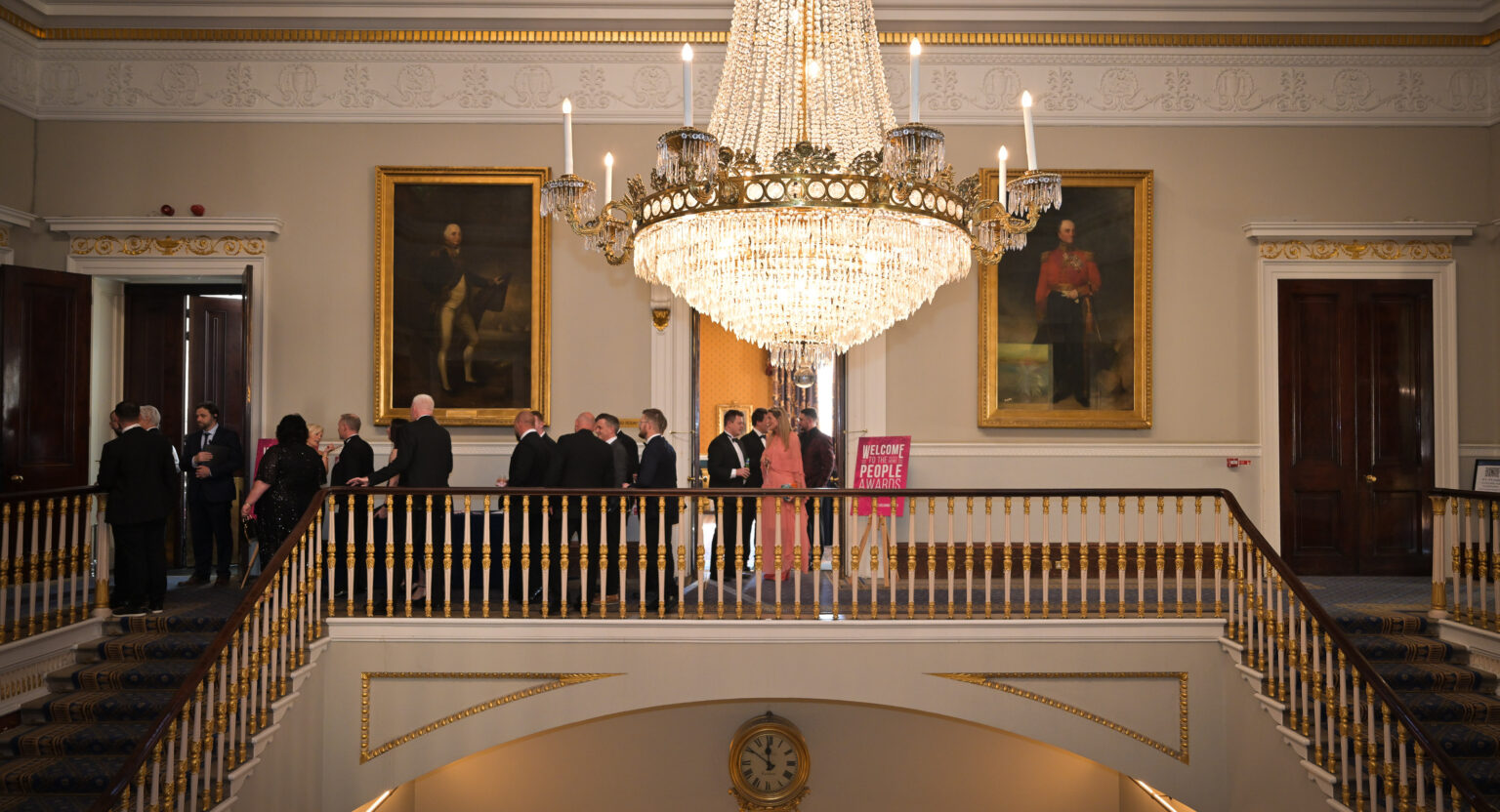 People Awards. An image of a georgian building with people mingling ahead of the event.