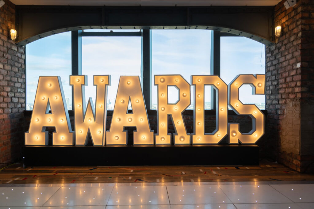 An image of event lights made up into the word "awards"