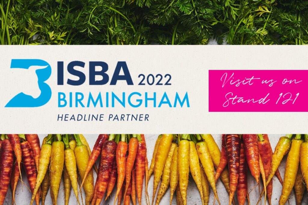 Promotional banner for ISBA 2022 in Birmingham with details about visiting Stand 121 with colourful carrots in the background.